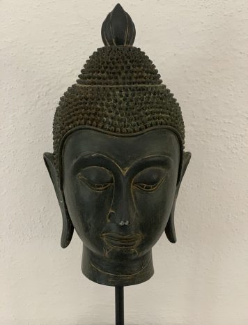 An Elegant and Handsome Buddha Head on a Plinth