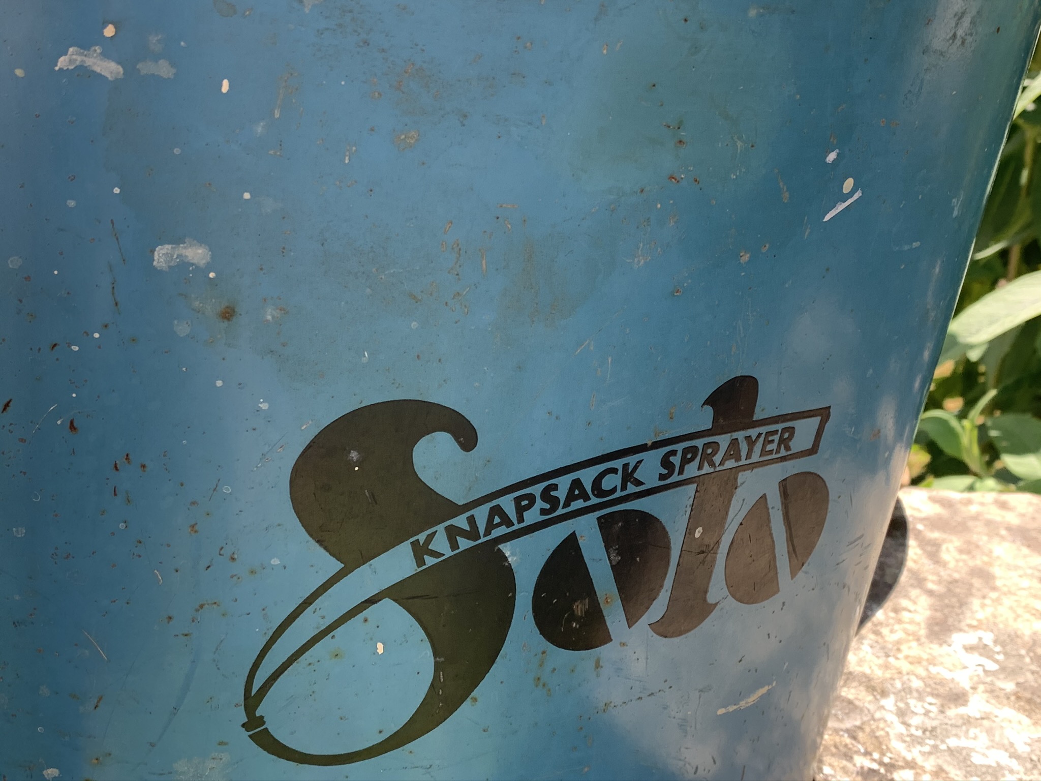 A Decorative Blue Metal Knapsack Sprayer With Straps - Image 2