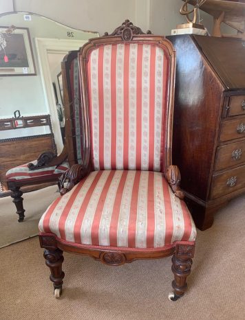 An Antique Victorian Ladies Walnut spoon back chair
