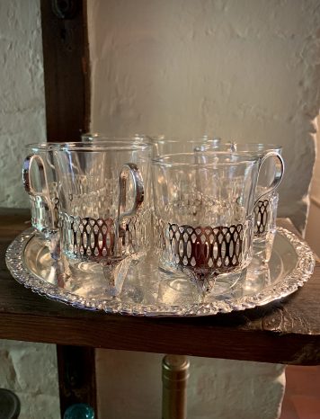 A set of 6 Toddy Glasses and Silver-plated Circular Gallery Tea Tray