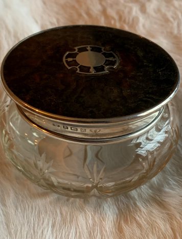 A cut glass vanity pot with Silver and Tortoiseshell lid