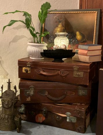 A Trio of Vintage Leather Suitcases