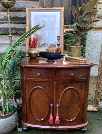 Regency style mahogany bowfront serving cabinet